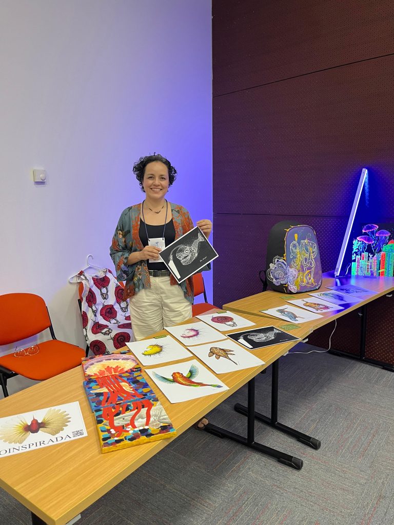 Artist presenting the completed acrylic triptych Vertical Journey Through the Ocean before it became part of a private collection in the United States.