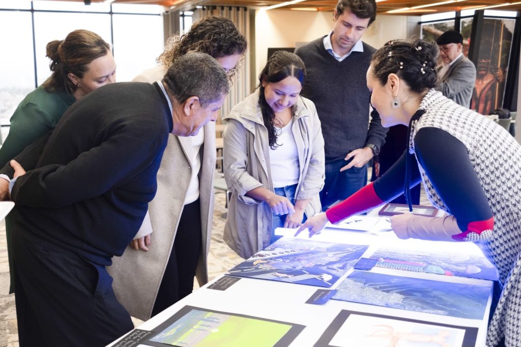 Discussing Turning Our Backs on the Sea with exhibition visitors.