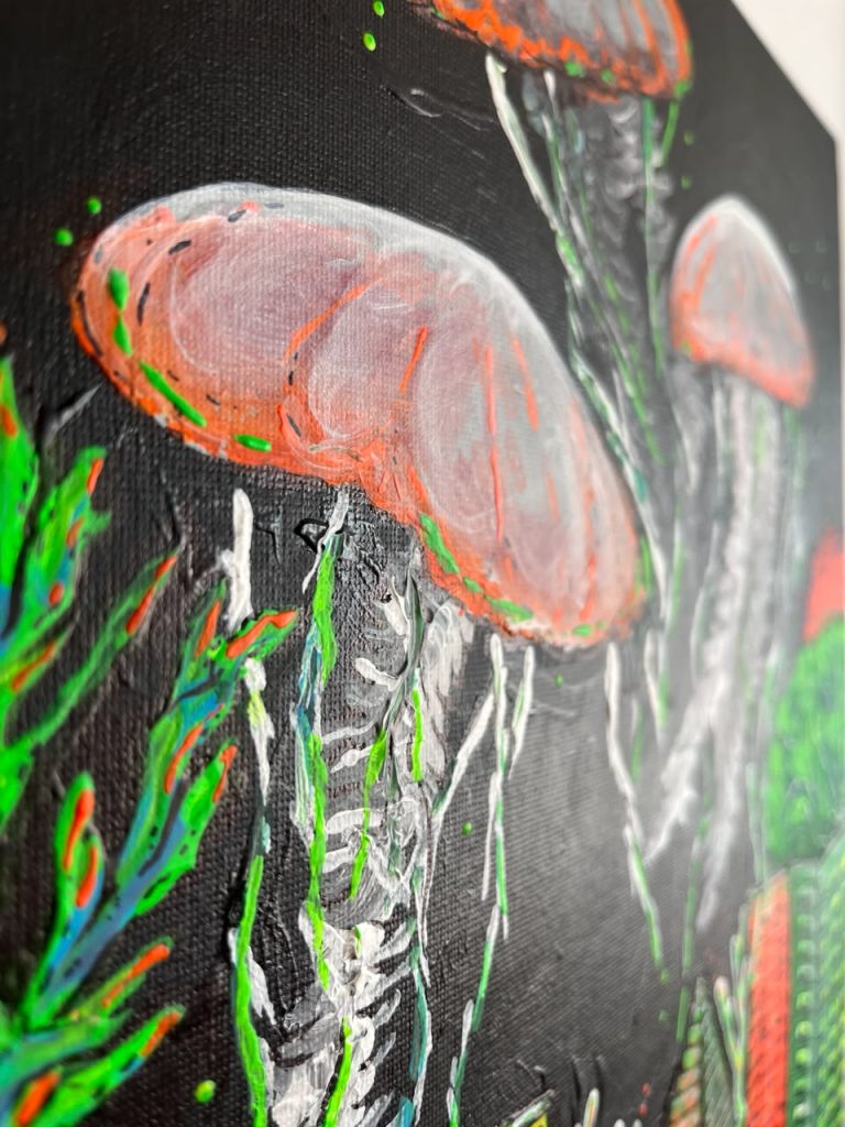 Close-up of a fluorescent jellyfish painted with acrylic on canvas by Elsa Quicazán.