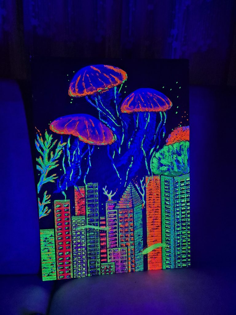 The artwork "Without the Ocean, There Is No City" illuminated under ultraviolet light, revealing fluorescent acrylic details.